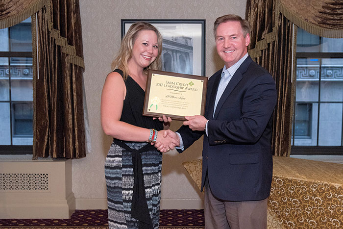 LeMoine Knox of Coleman, Texas, attended the 2017 Farm Credit Young Leaders Program on behalf of Central Texas Farm Credit. She accepted a certificate for completing the program in New York City from Stan Ray, right, Farm Credit Bank of Texas chief administrative officer and Tenth District Farm Credit Council president.